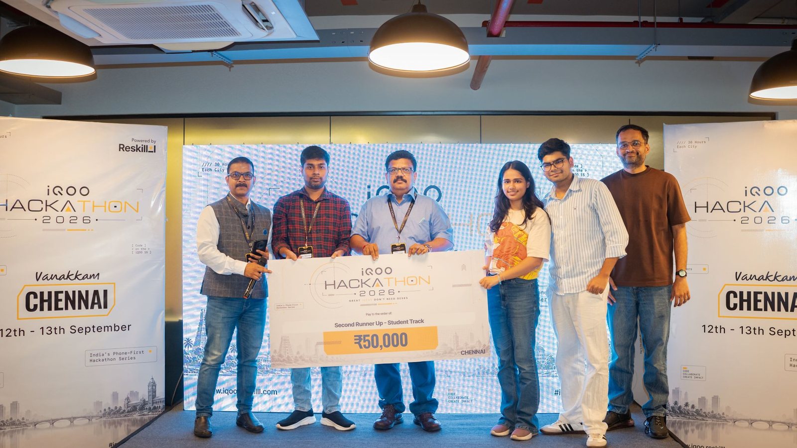 Shaswat Naman with the iQOO Hackathon 2026 Chennai organizers and fellow participants, holding the second runner-up cheque for the Student Track