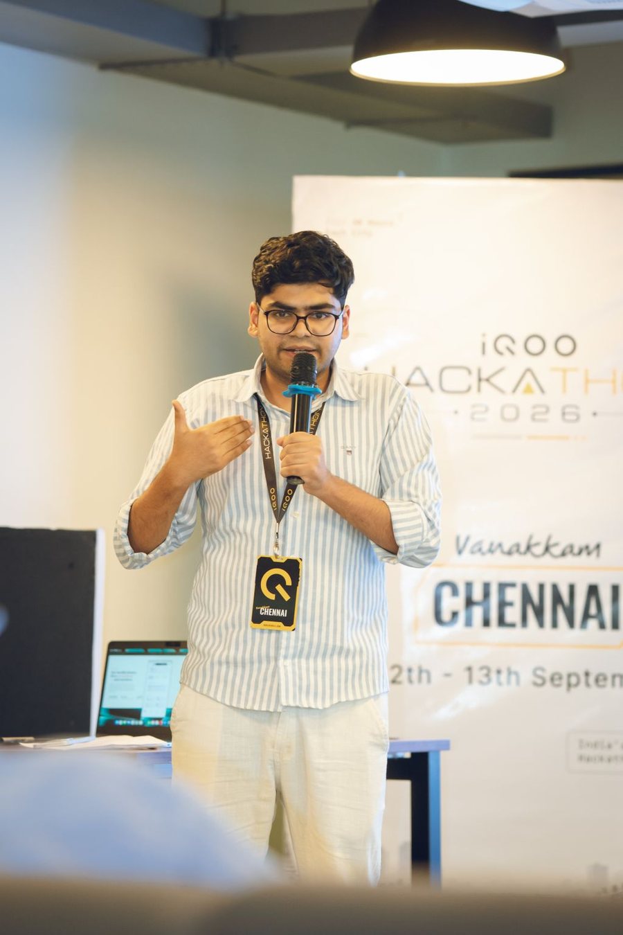 Shaswat Naman presenting on stage at the iQOO Hackathon 2026 in Chennai